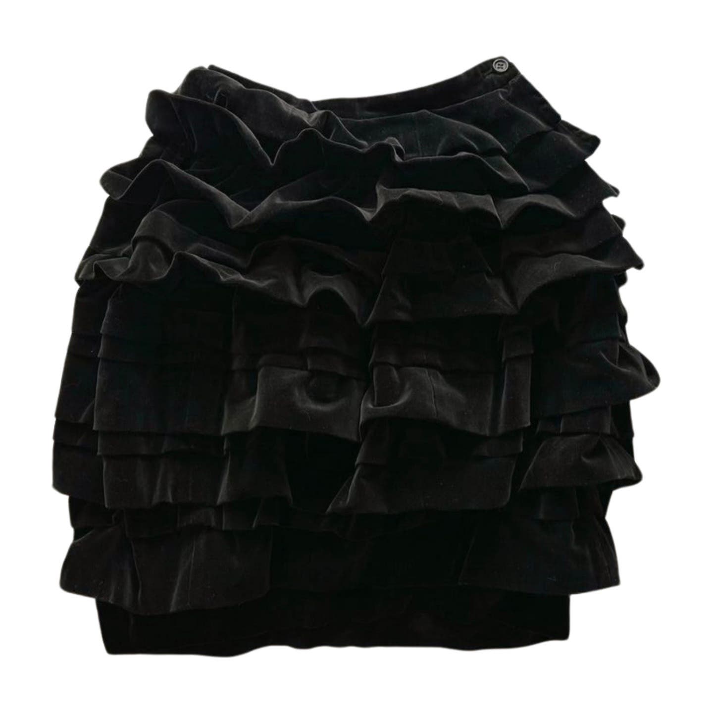 A Vintage 1990 Comme des Garçons Skirt is shown in vintage condition. The skirt has multiple ruffled layers, creating a voluminous, textured appearance. The material appears soft and velvety, contributing to the skirt's elegant and stylish design reminiscent of 90s Comme des Garçons.